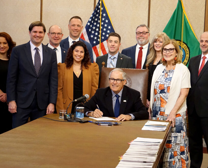 Governor Inslee signing HB 1527 Tax Incrament Financing bill with State Treasurer Pellicciotti, Rep. Sharon Wylie, and Port of Vancouver staff.